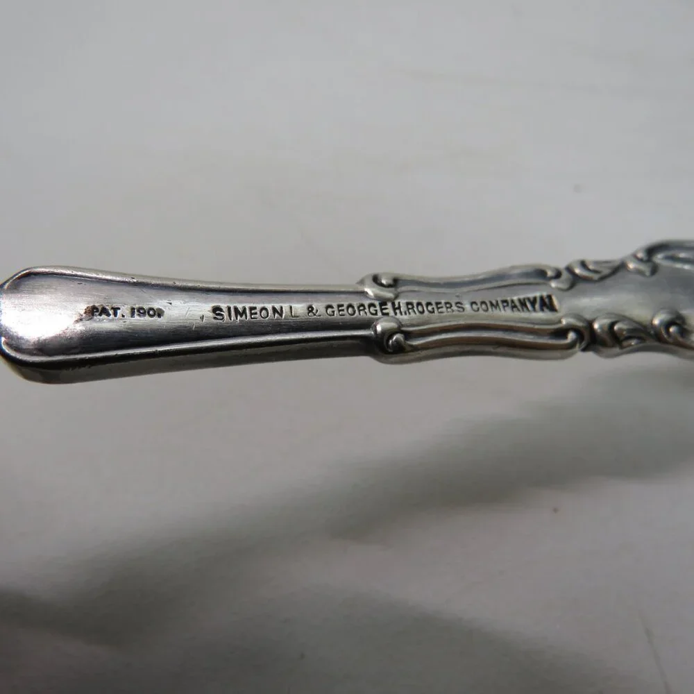 Webster Twisted Handle Butter Knife silver plated  S.L. & G.H. Rogers Company A1