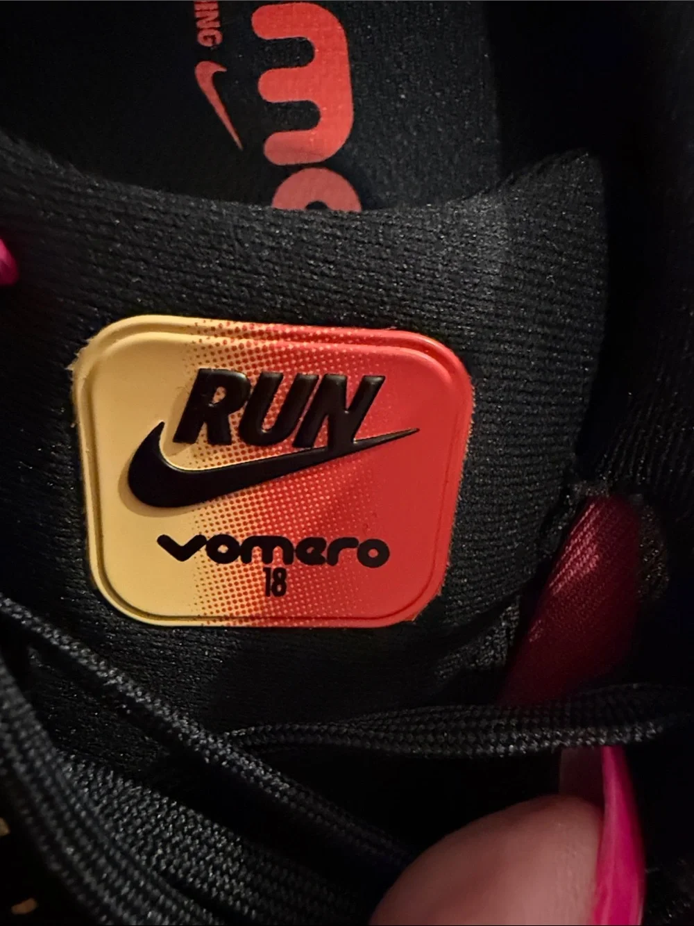 Nike Black Running Sneakers with Red and Yellow Accents