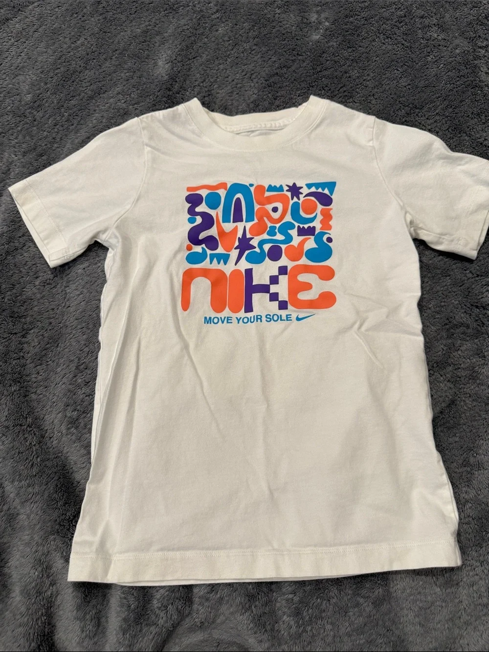 Nike White Kids' Graphic Tee with Orange & Blue Print