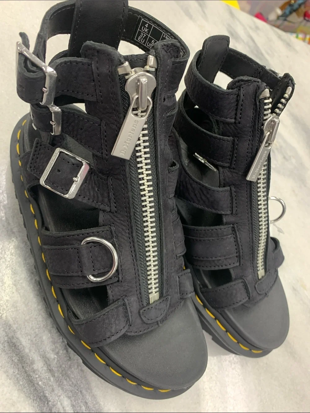 Dr. Martens Black Leather Gladiator Sandals with Yellow Stitching